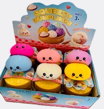 Дитячий м'який сквиш антистрес Пельмень Бао 10 см Squishy Dumplings, іграшка-сюрприз із милою мордочкою в оригінальній коробочці-пароварці 555-6 фото