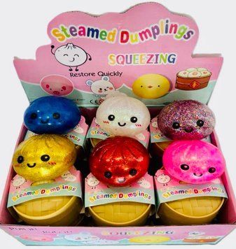 Дитяча іграшка-антистрес Сквиш Пельмень Бао 10 см Glitter Dumpling, усміхнений м'який сквиш із блискітками в індивідуальній коробочці-пароварці 555-8 фото
